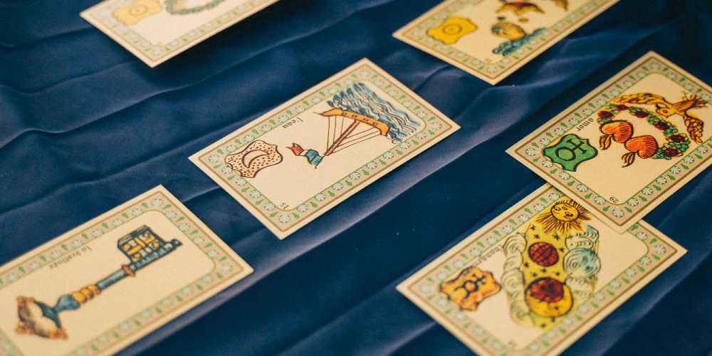 tarot cards on blue rug - casino card tarot reading