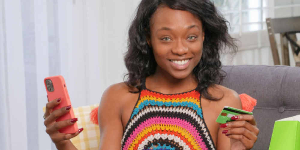 women using her mobile as an online gambling payment method