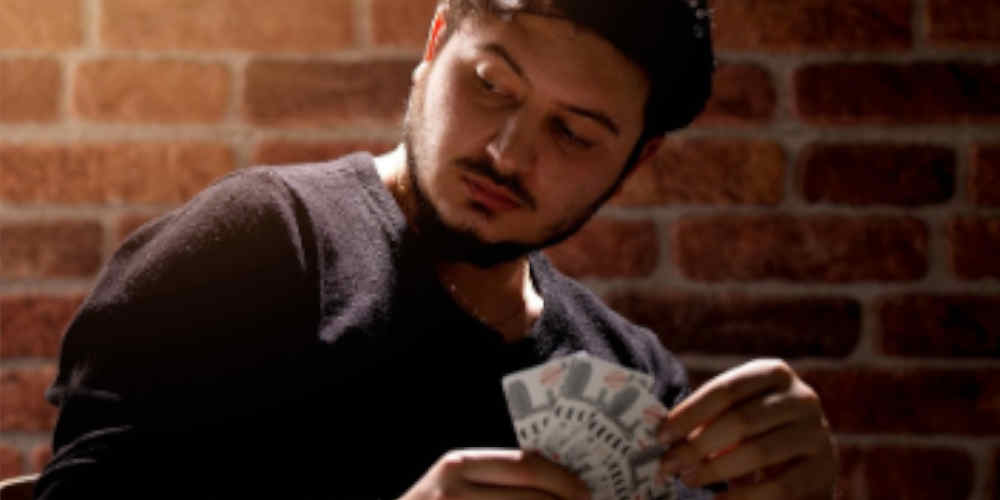 abstract casino background showing optimal strategy in Three Card Poker concepts