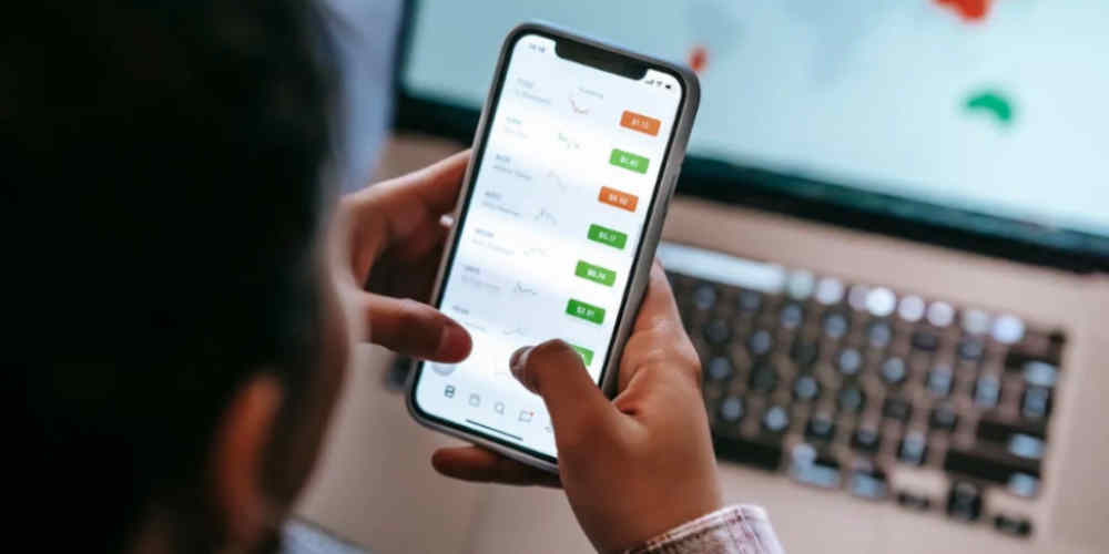 man betting on phone