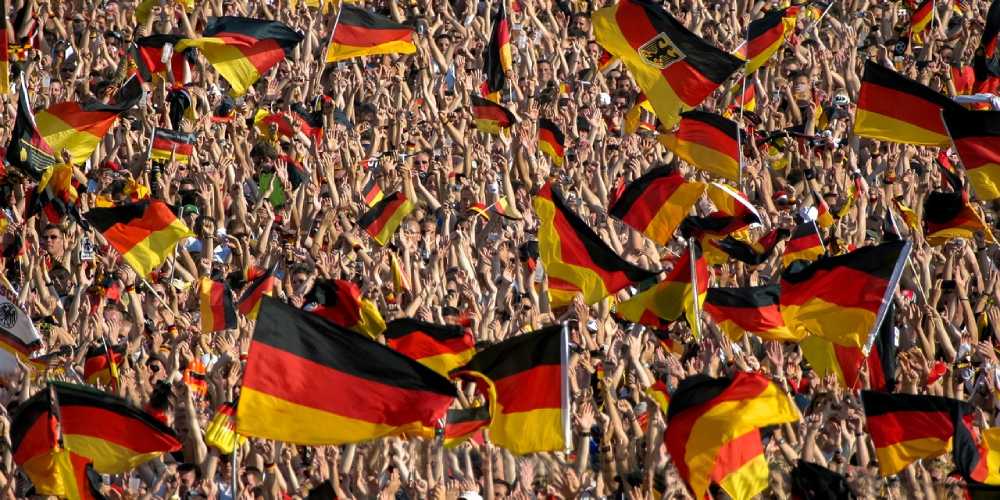 german soccer fans with flags - bundesliga odds and predictions march 14 2026