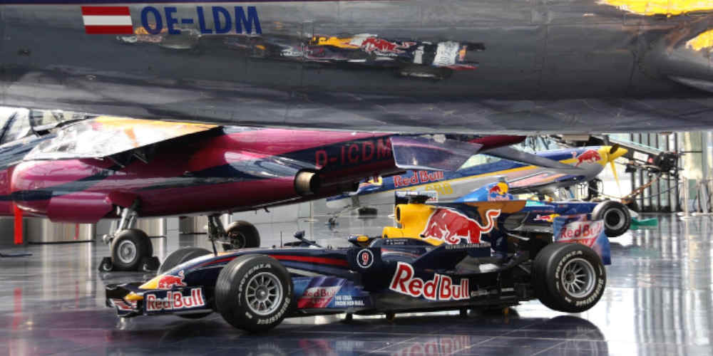 why Formula 1 sponsorship works represented with f1 car at an airplane expo