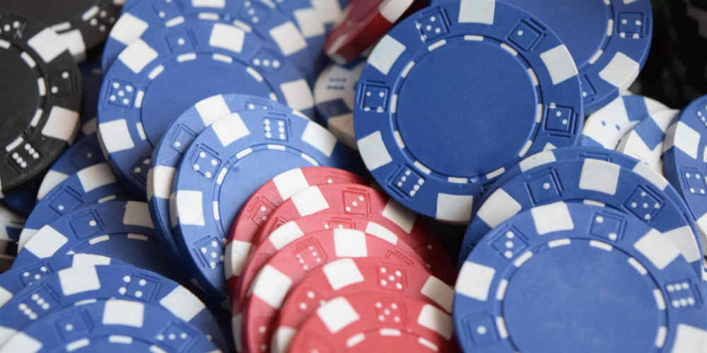 casino chips representing the winnings when using an AI gambling buddy