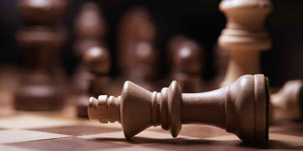 Gianni Infantino Voluntary Resignation represented with a white chess piece