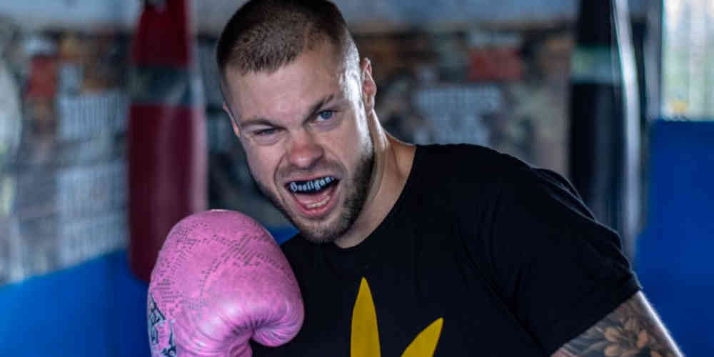 reasons for banning boxing represented with boxer ugly face