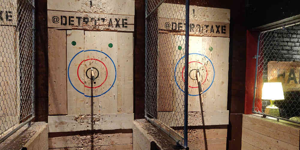 betting on axe throwing represented with an axe throwing room
