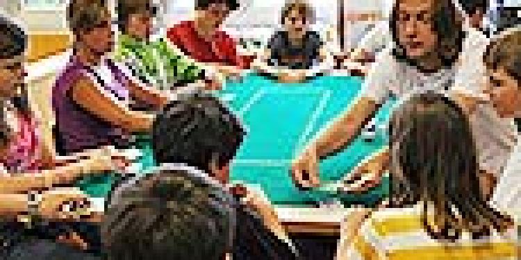 Children Playing Poker in Switzerland during Gambling Summer Camp